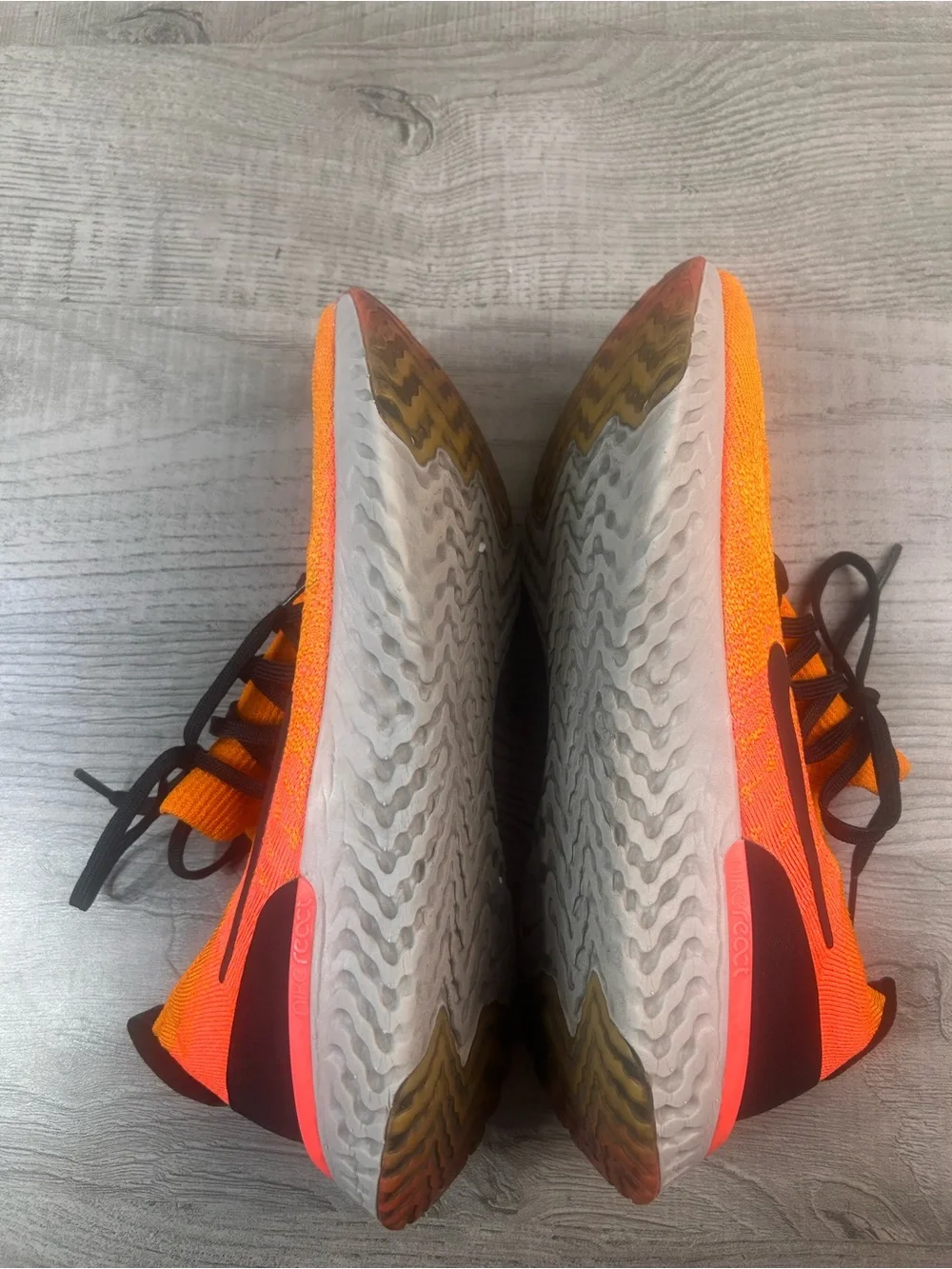 Nike Bright Orange Flyknit Sneakers with Black Accents Women’s Size 10